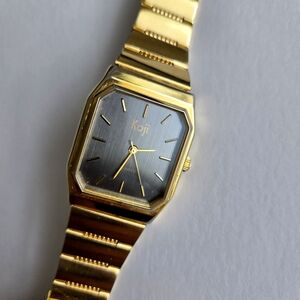 Koji unisex gold tone watch black dial adjustable strap